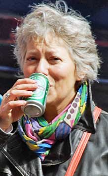 Paula having a beer at the Queen's Day celebration, Amsterdam.