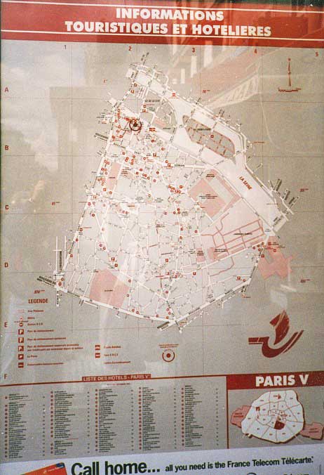 A map of Arrondissement V posted on a street in Paris, France.