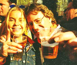 Celebrating Koninginnedag, the Queen's Day festival in Amsterdam, Holland.