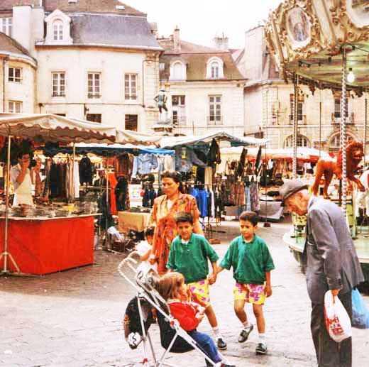 At a market and fair in France, Stephanie makes new friends.