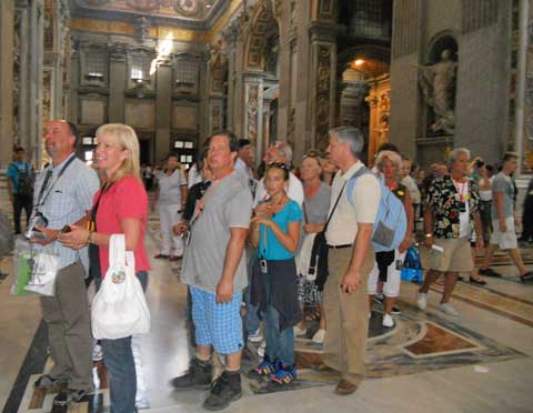 Tourists in line to enter a Rome museum.