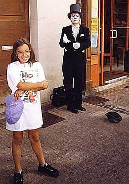 Stephanie poses with a street mannequin in France.