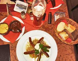 Brats and beer at the Taschenbergpalais Kempinski Bistro, Dresden, Germany.