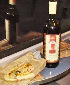 Night train dinner from Prague to Dresden, wine and sandwich.