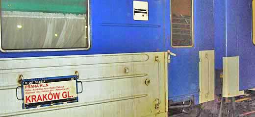 The icon of a bunk with a person in recline indicates a sleeping car in Prague, Czech Republic.