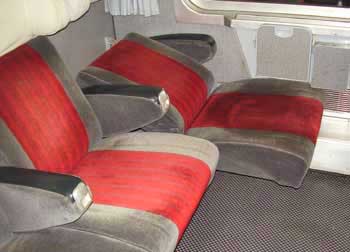 Pulling out the seats in a train compartment to recline for sleep. http://www.enjoy-europe.com/hte/chap17/p1070374.jpg