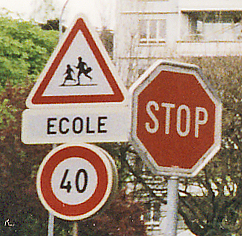 A sign warning of running children near a school in Paris. http://www.enjoy-europe.com/hte/chap18/Chap18images/7c0001StopEcole.jpg