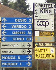 Direction signs in Nova Milanese, Italy. http://www.enjoy-europe.com/hte/chap18/Chap18images/P1080384ItalianRoadSigns.jpg