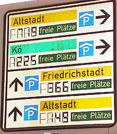 A sign indicating parking structures in downtown Düsseldorf, Germany.